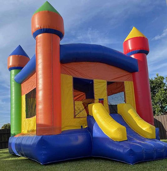 Colorful inflatable bounce house castle with slide